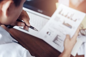 midsection-woman-reading-book
